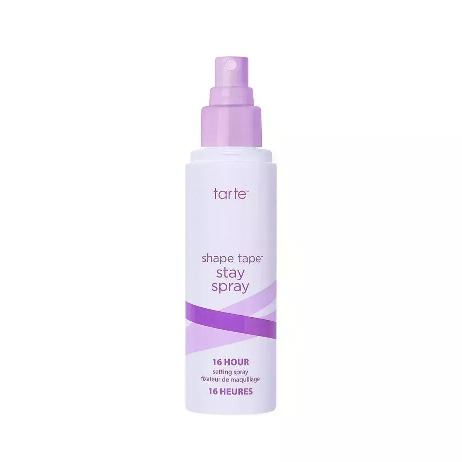Tarte Shape Tape Stay Spray Vegan Setting Spray lavender spray bottle with purple stripes on white background