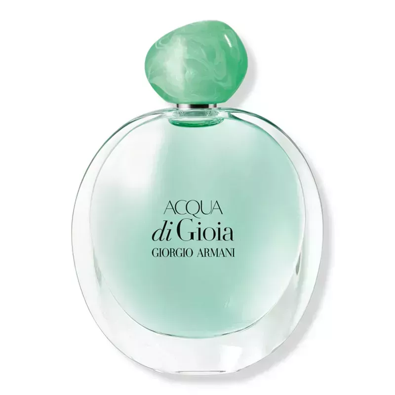 A perfume bottle filled with the light blue Giorgio Armani Acqua di Gioia Eau de Parfum on a white background