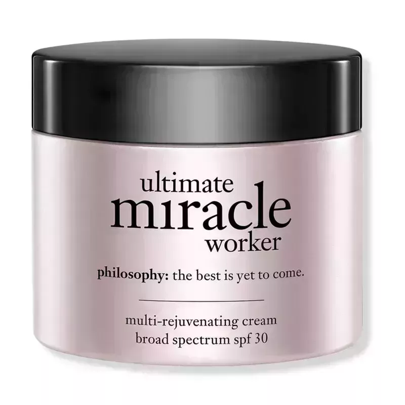 A pink jar with black cap of the Philosophy Ultimate Miracle Worker SPF 30 Moisturizer on a white background