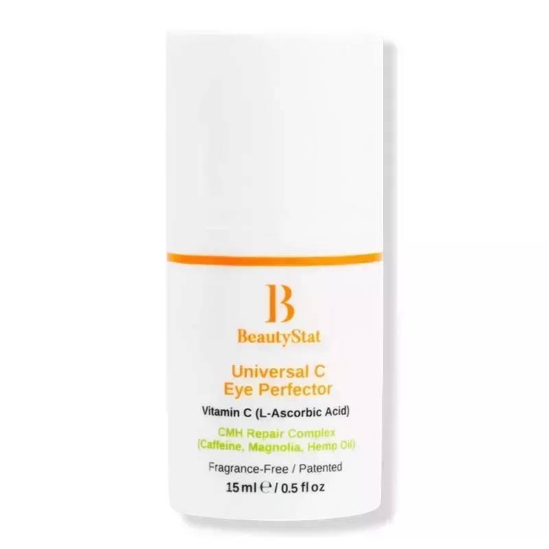 A white pump bottle with orange text of the BeautyStat Universal C Eye Perfector on a white background