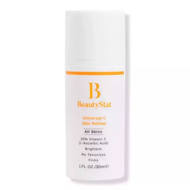 A white pump bottle with orange text of the BeautyStat Universal C Skin Refiner on a white background