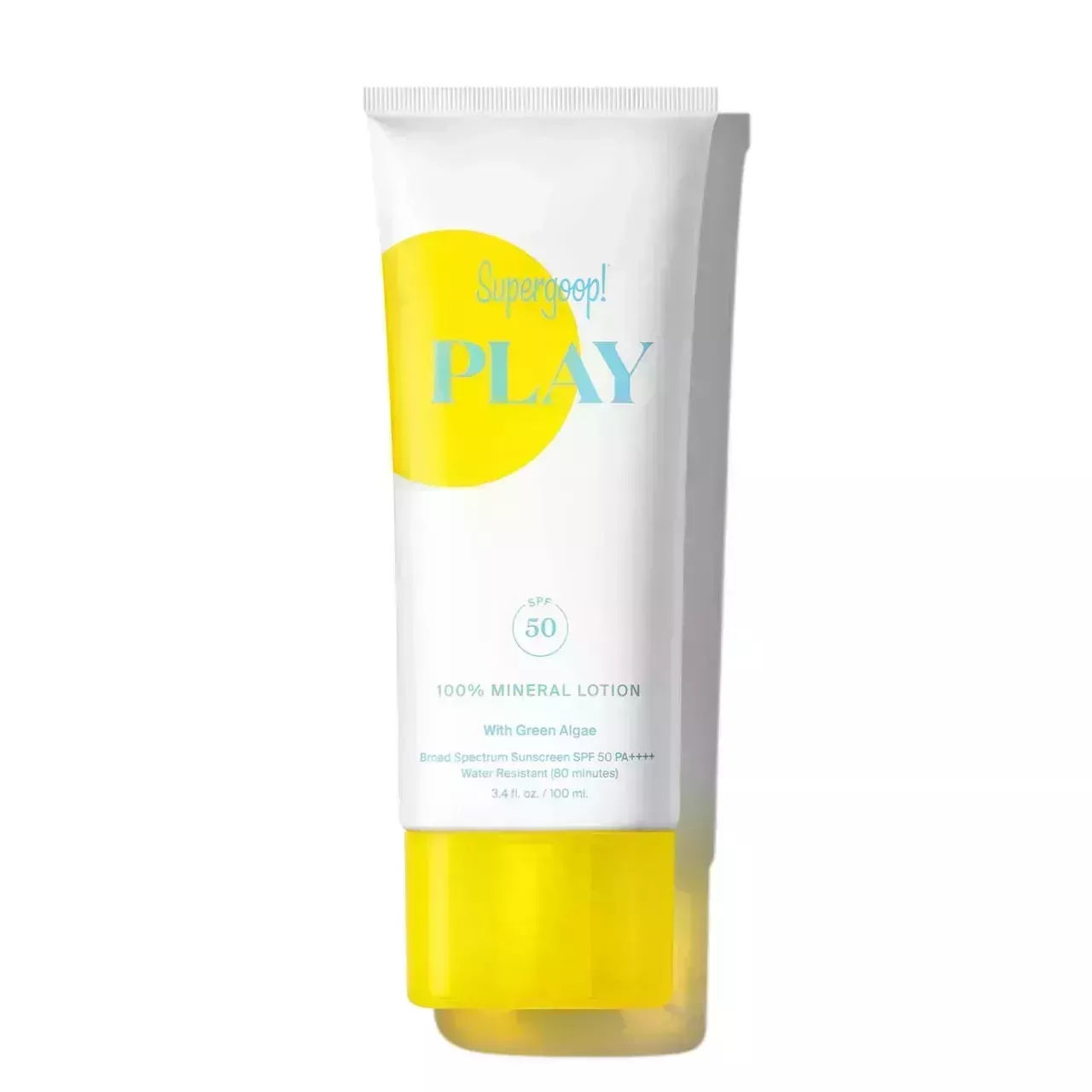 Supergoop Play 100% Mineral Lotion SPF 50 with Green Algae white tube with yellow dot and cap on white background