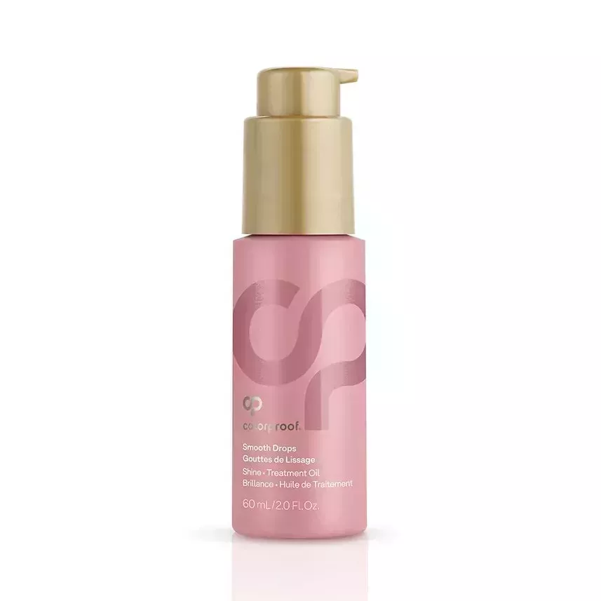 Colorproof Smooth Drops pink bottle with gold cap on white background