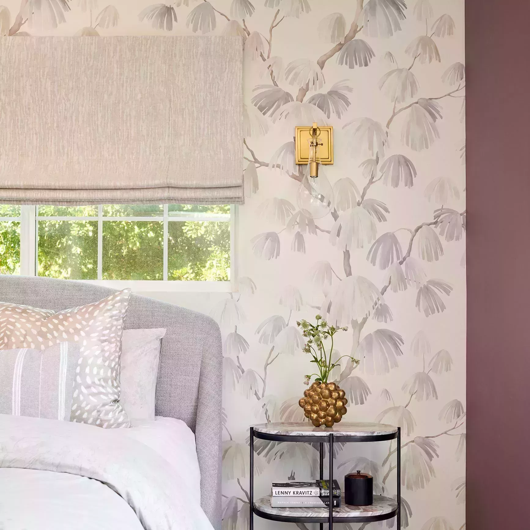 bedroom with purple wall and floral wallpaper accent wall