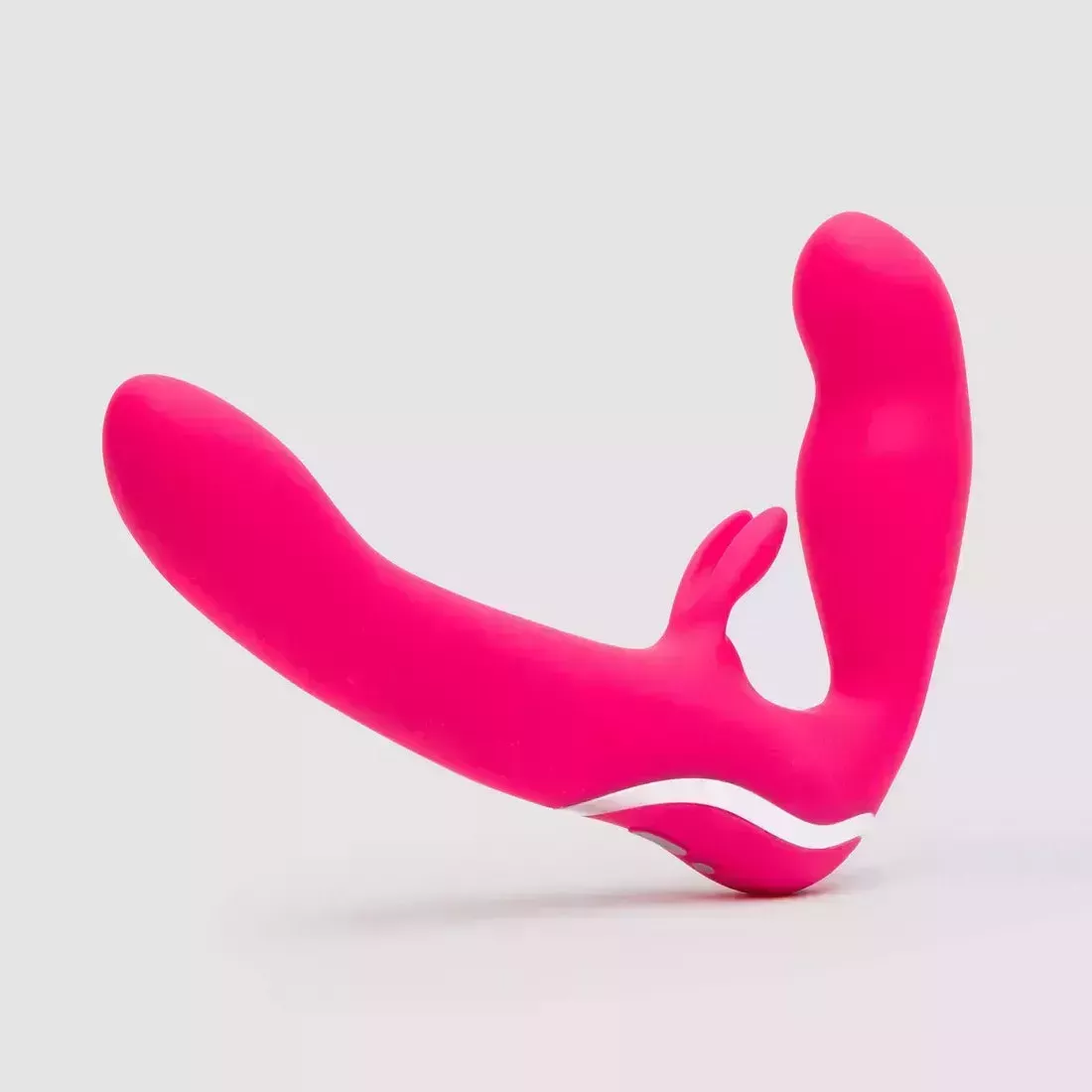 Happy Rabbit Rechargeable Vibrating Strapless Strap-On hot pink rabbit vibrator strap on on gray background