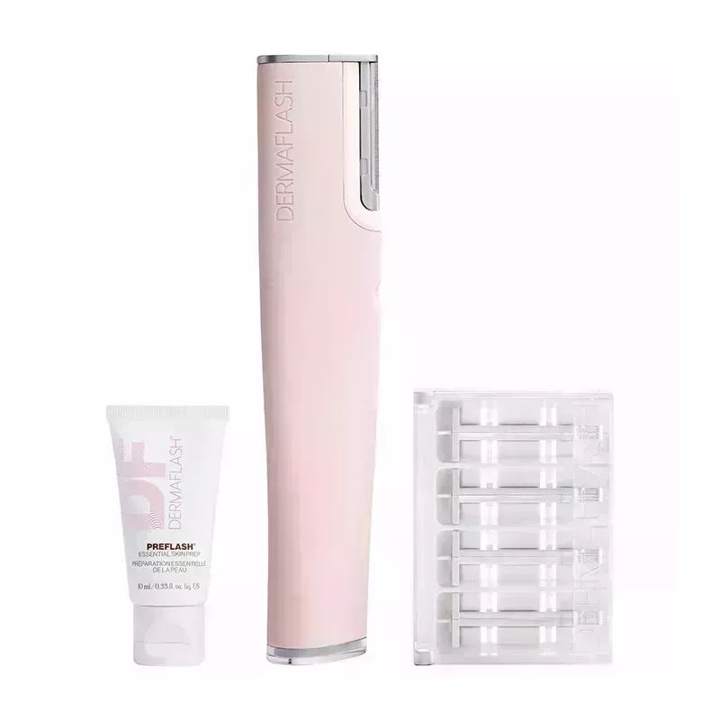 The light pink Dermaflash Luxe+ dermaplaning skin-care set on a white background