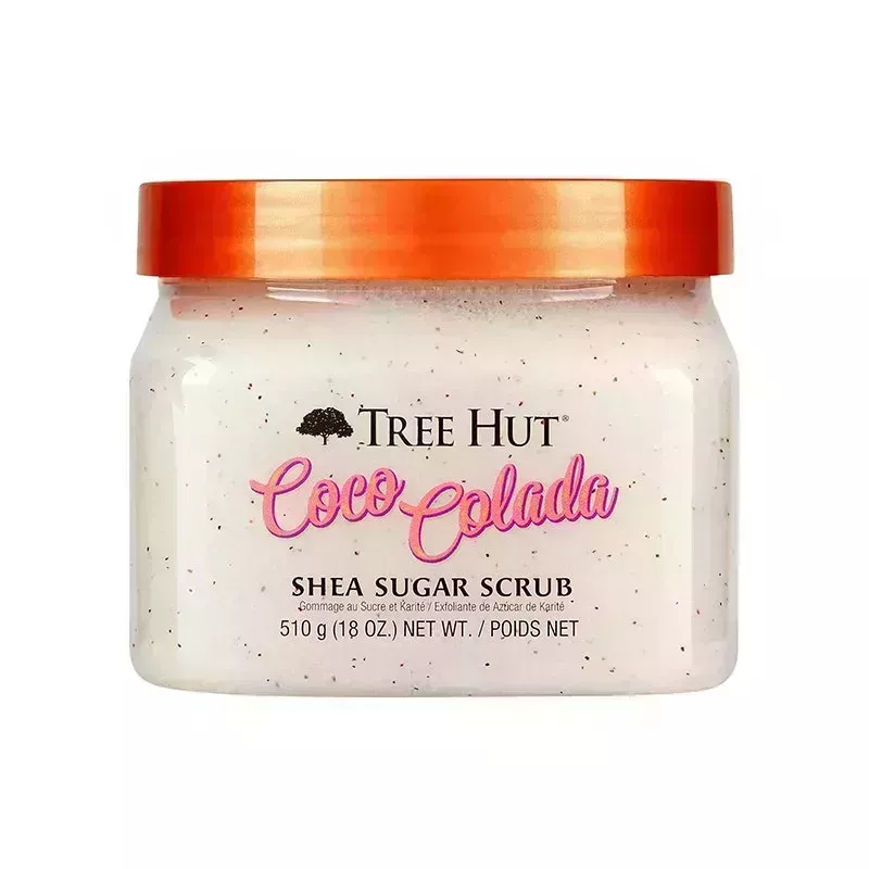 Tree Hut Coco Colada Shea Sugar Scrub: A clear jar filled with a white body scrub and topped with an orange lid on a white background