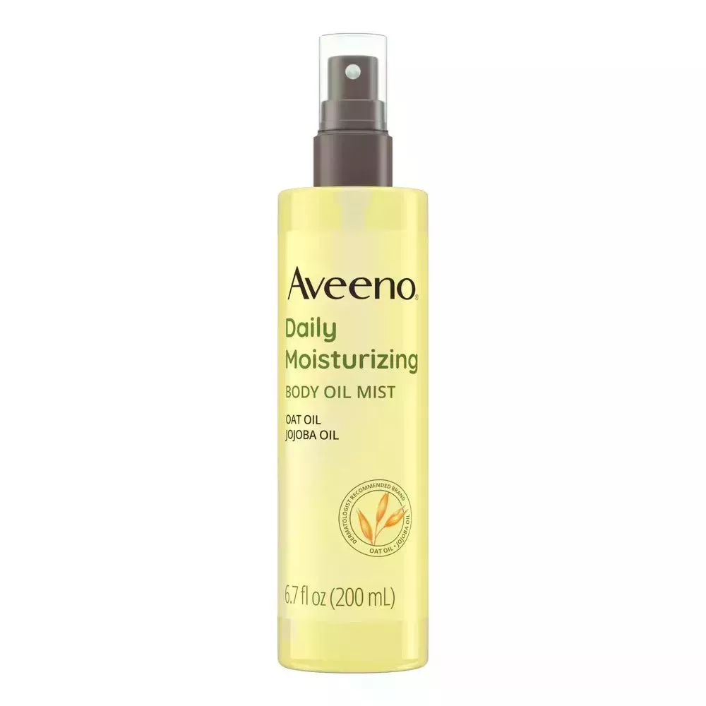 Aveeno Daily Moisturizing Body Oil Mist yellow spray bottle on white background