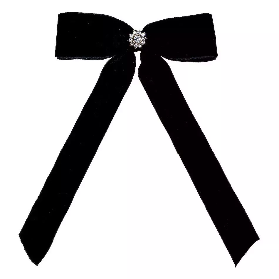Emi Jay Bow Barrette black velvet bow with a silver charm in the center on white background
