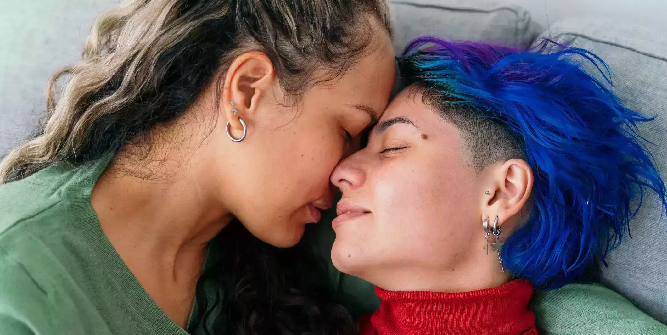 close up of lesbian couple in love with valentine winter clothes