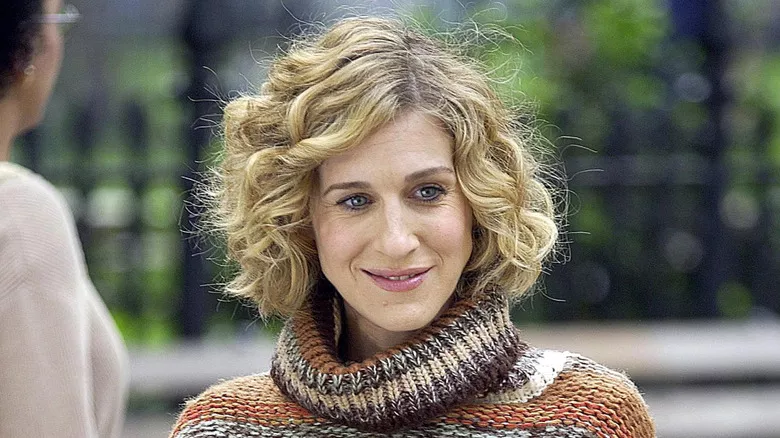 Sarah Jessica Parker smiling on Sex and the City with short hair