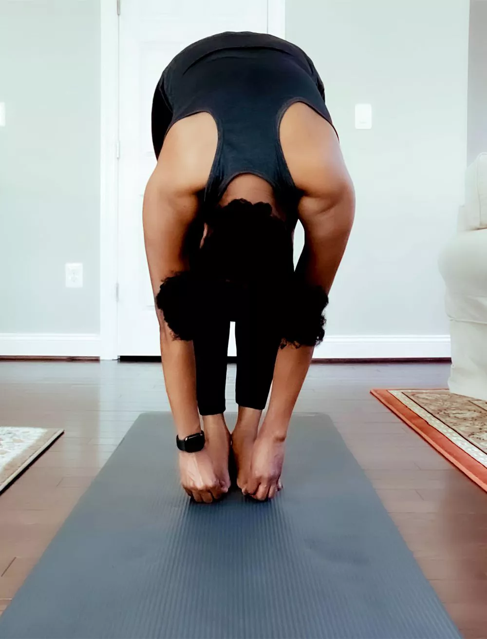 Flexión Hacia Adelante de Pie