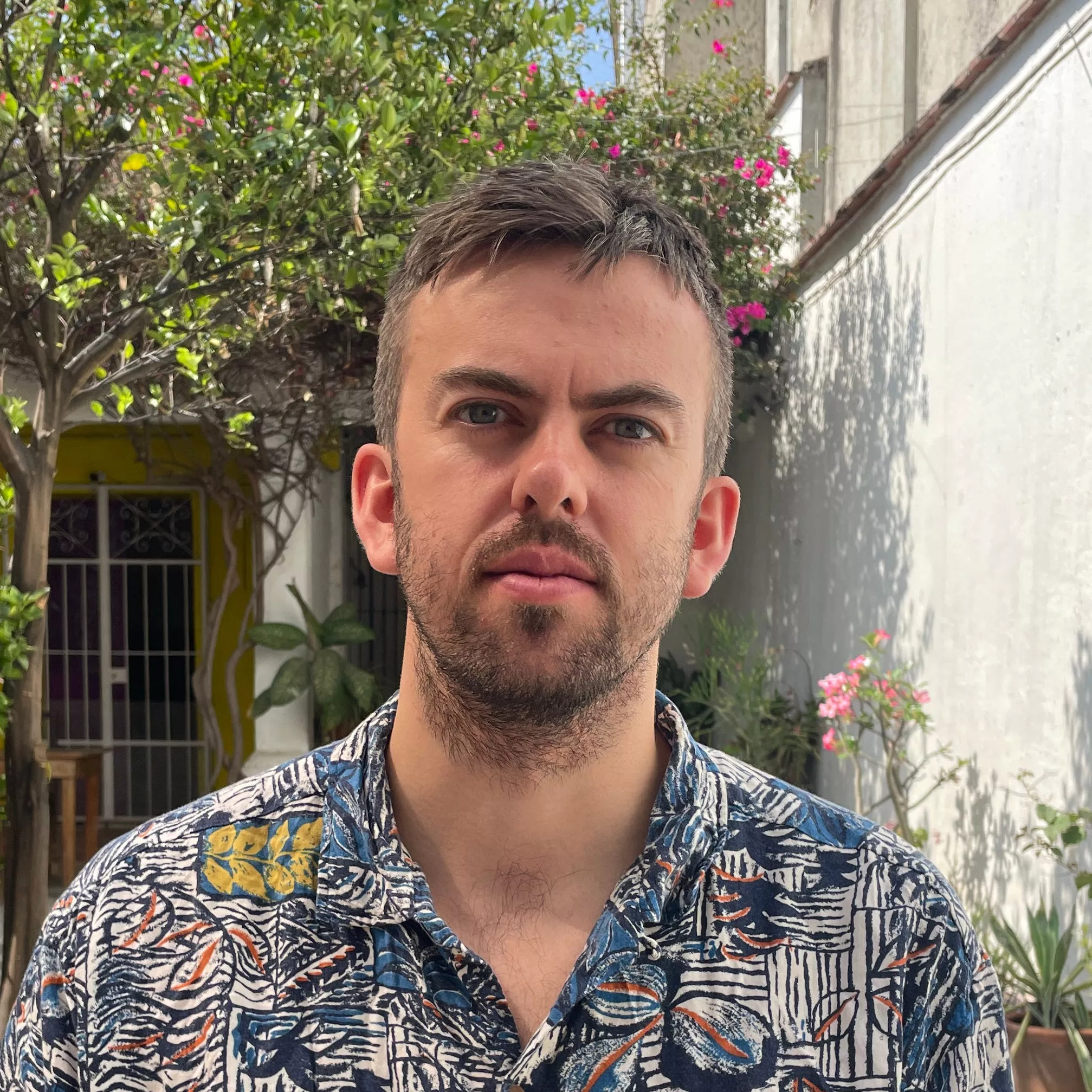Reporter Rob Price sitting at a table