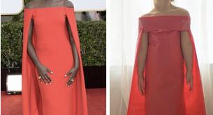 Una niña copia en papel los vestidos de las alfombras rojas